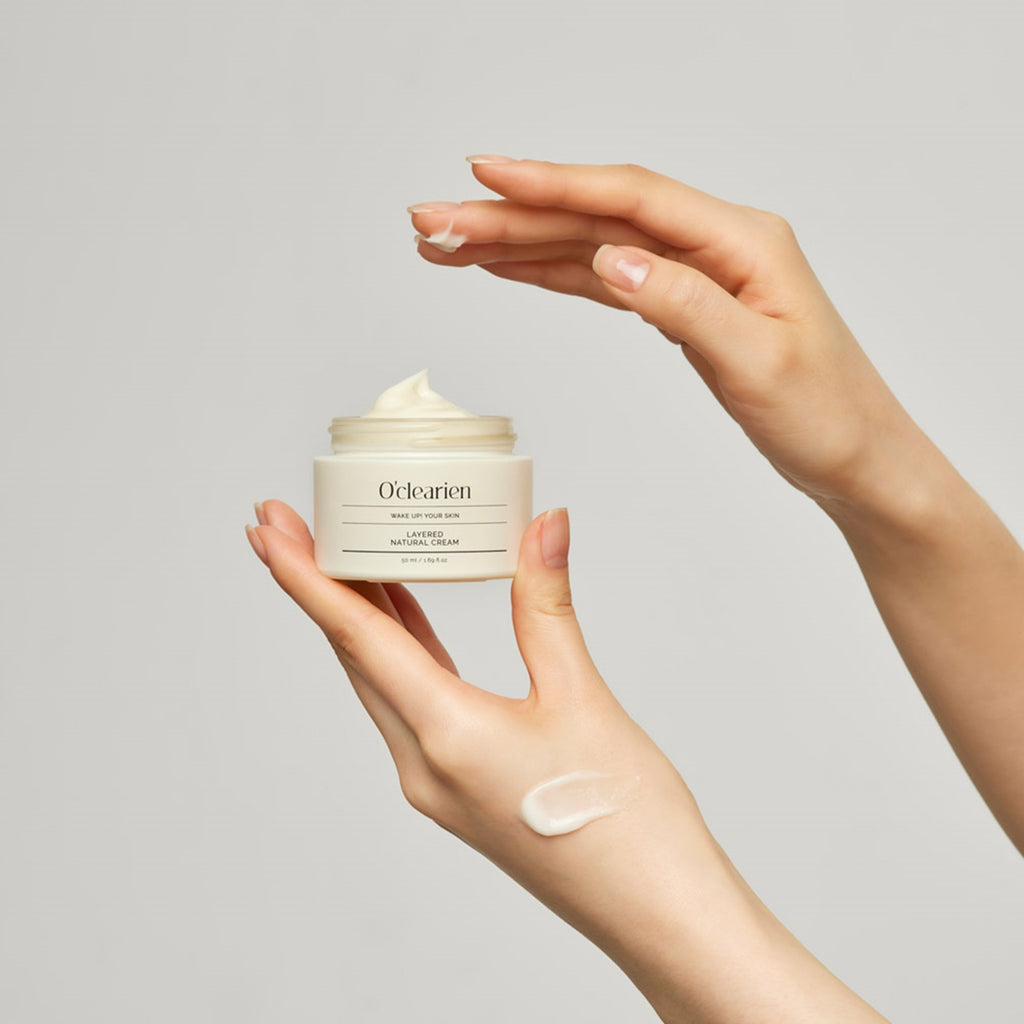 applying natural cream on the left hand.